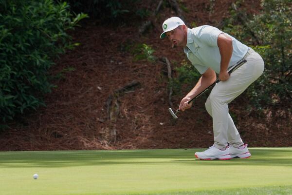 Bryson DeChambeau reacts after missing a putt on the 12th hole during the second round at the Masters golf tournament, Friday, April 11, 2025, in Augusta, Ga. (AP Photo/Matt Slocum)