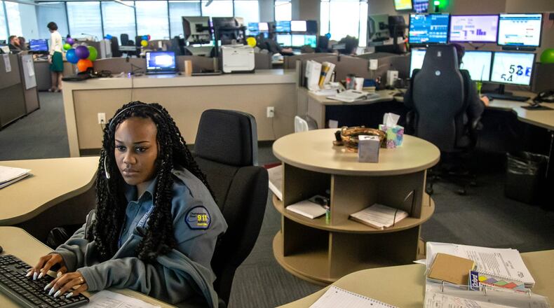 Dispatch operator Kelah Handley answers calls at a Sandy Springs 911 call center on Wednesday, April 17, 2019. STEVE SCHAEFER / SPECIAL TO THE AJC