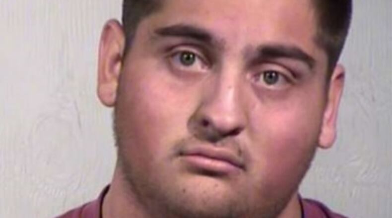 Dustin Warren Saldana was arrested Saturday in Phoenix.