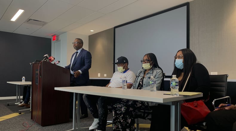 Attorney Shean Williams and D’Mari Johnson's family addressed the media Monday morning, more than a week after the 11-year-old was shot in the back of the head outside a skating rink in DeKalb County. (Credit: Caroline Silva / Caroline.Silva@ajc.com)