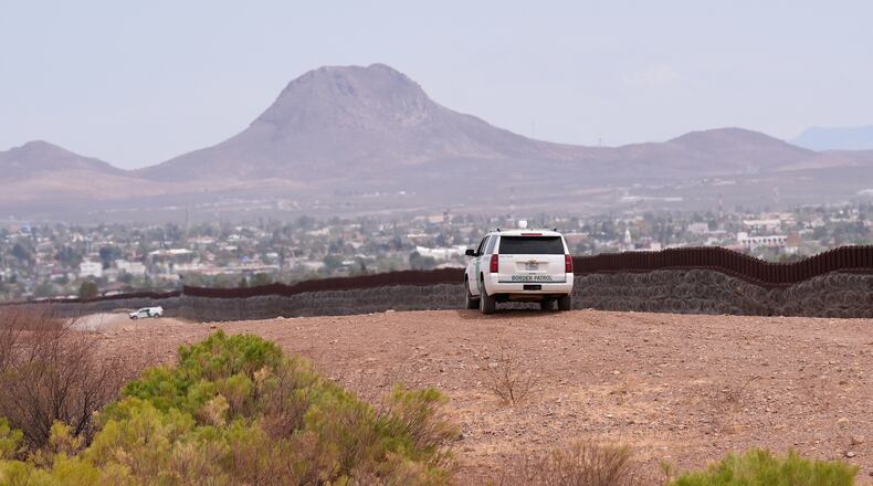 FILE - The U.S. Border Patrol keeps watch along the US-Mexico border Thursday, April 3, 2025, in Douglas, Ariz. (AP Photo/Ross D. Franklin,File)