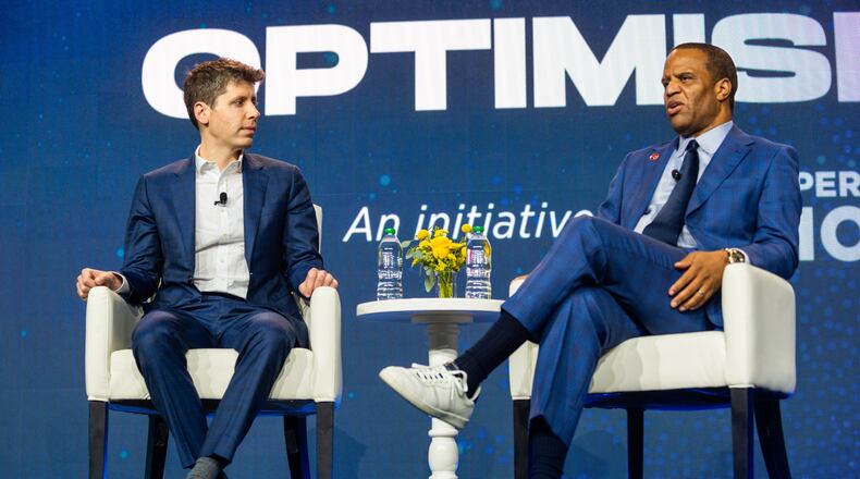 231211 ATLANTA, GA — From left, OpenAI CEO Sam Altman and founder and CEO of Operation HOPE John Hope Bryant speak at the HOPE Global Forums at the Hyatt Regency in downtown Atlanta on Monday, Dec. 11, 2023. 
(Bita Honarvar for The Atlanta Journal-Constitution)