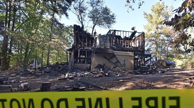 October 23, 2016 Duluth - Five adults were found dead after a fire gutted a home in the 2200 block of Post Oak Drive in unincorporated Duluth early Sunday morning on Sunday, October 23, 2016. Five people are dead after a fire gutted a home in unincorporated Duluth early Sunday morning, Gwinnett County fire officials said. Gwinnett County Department of Fire and Emergency Services Capt. Tommy Rutledge confirmed that five adults were found dead in the home in the 2200 block of Post Oak Drive NW, a two-story structure in the middle of a dead-end street near Old Peachtree Road. HYOSUB SHIN / HSHIN@AJC.COM