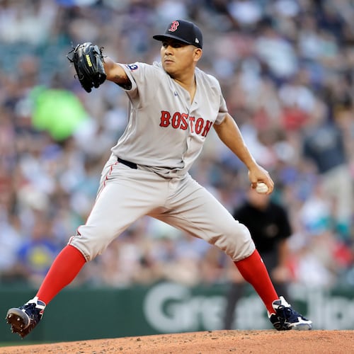 Boston Red Sox starting pitcher Ranger Suarez throws against the Seattle Mariners during the fifth inning of a baseball game, Friday, June 19, 2026, in Seattle. (AP Photo/John Froschauer)
