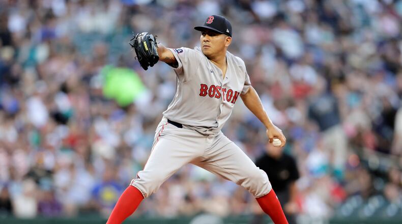 Boston Red Sox starting pitcher Ranger Suarez throws against the Seattle Mariners during the fifth inning of a baseball game, Friday, June 19, 2026, in Seattle. (AP Photo/John Froschauer)