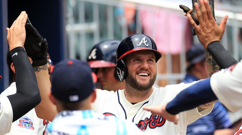 The Braves’ Matt Adams celebrates a home run during Sunday’s win over Arizona at SunTrust Park. (Photo by Daniel Shirey/Getty Images)