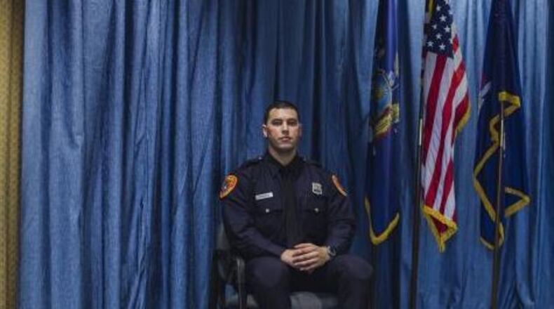 Matias Ferreira, who had both legs amputated below the knee after an incident in Afghanistan, is now a police officer in Suffolk County, N.Y. (Credit: Associated Press)