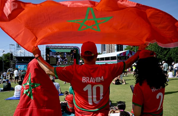Local Moroccan fans at the FIFA Fan Festival in Centennial Olympic Park. (Hyosub Shin/AJC)