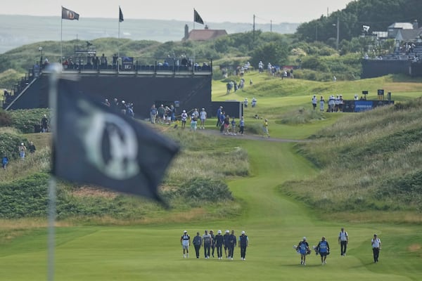 A group that includes Shane Lowry of Ireland make their way down the 12th fairway during a practice round for the British Open golf championship at the Royal Portrush Golf Club, Northern Ireland, Wednesday, July 16, 2025. (AP Photo/Francisco Seco)