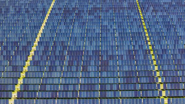 An aerial photo shows a close-up of solar panels on a construction site where Silicon Ranch is building one of Georgia’s largest solar farms near Alma. (Miguel Martinez/AJC)