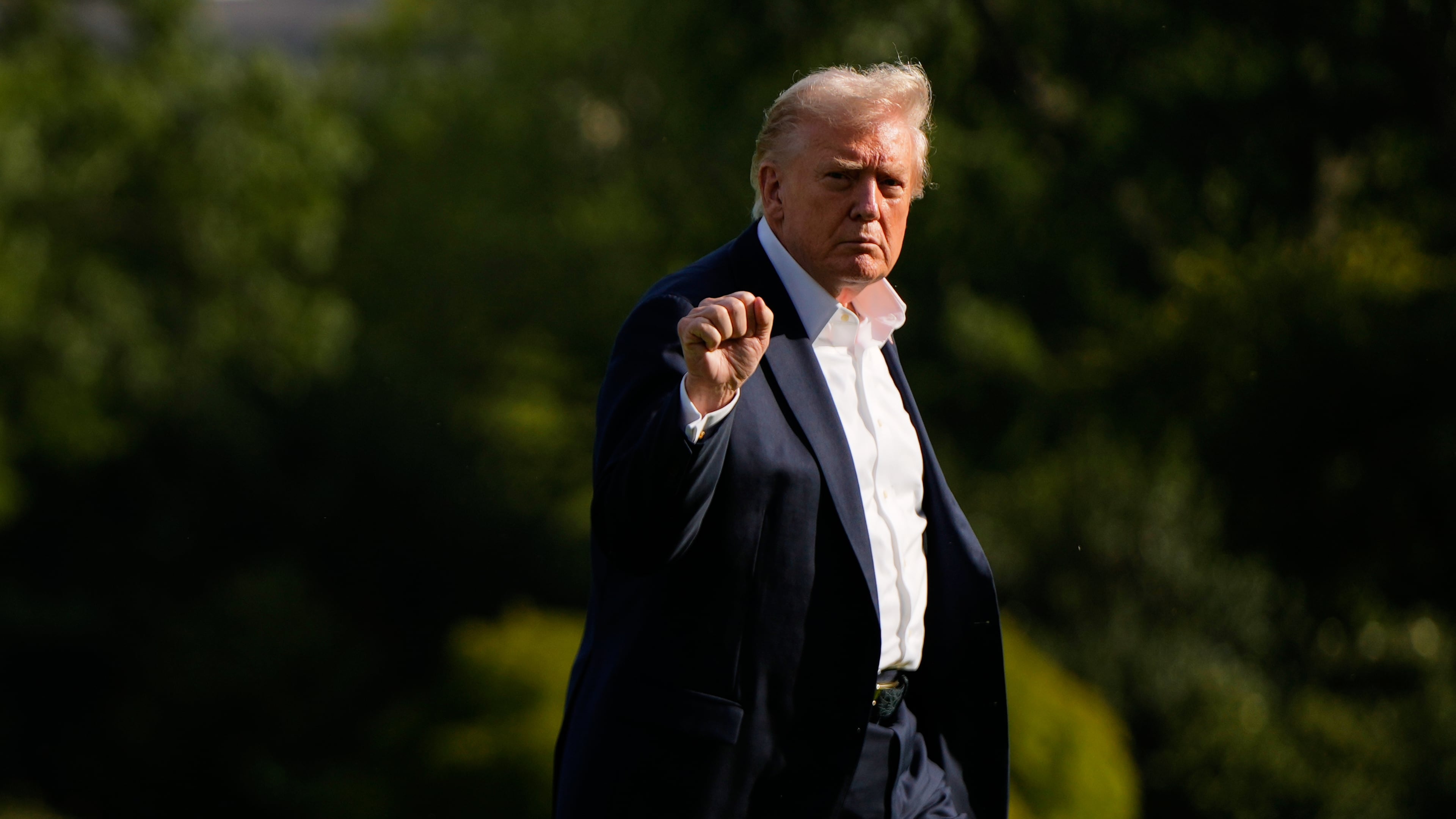 President Donald Trump gestures as he arrives at the White House, Friday, Sept. 26, 2025, in Washington. (AP Photo/Julia Demaree Nikhinson)