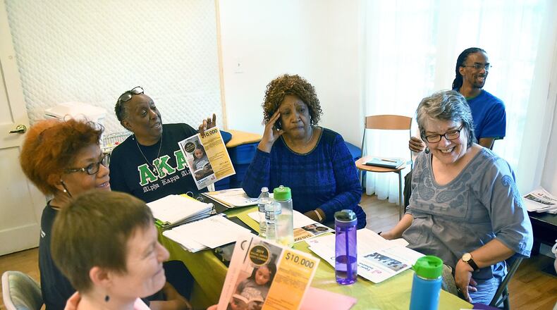 Members of the DeKalb Remembrance Committee meet in May to continue planning events that will culminate in the unveiling of lynching markers in Decatur and Lithonia next year. RYON HORNE / RHORNE@AJC.COM