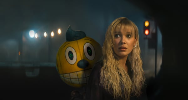 Millie Bobby Brown's Michelle meets Cosmo, a robot voiced by Alan Tudyk, in "The Electric State." The action sci-fi film was also shot in Georgia. (Netflix/TNS)