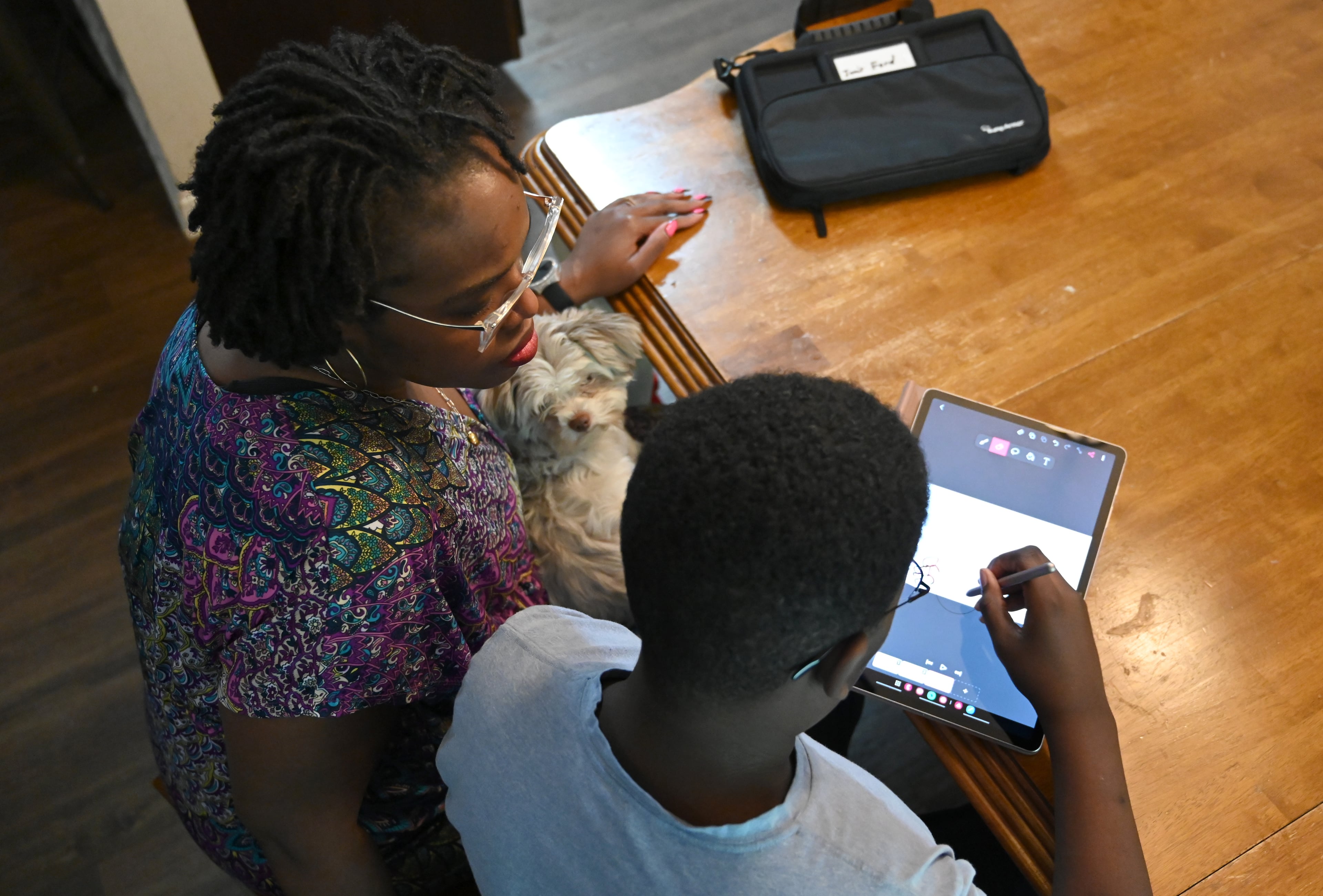Jatoyia Armour feared her son may have been funneled into GNETS partly because he was Black. She says that during her court battle, a school official's testimony led her to believe that her 5-year-old was denied services because he was Black. (Hyosub Shin/AJC)