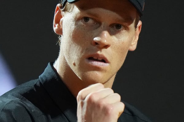 Italy's Jannik Sinner celebrates a winning point during a round of sixteen match against Argentina's Francisco Cerundolo at the Italian Open tennis tournament in Rome, Tuesday, May 13, 2025. (AP Photo/Andrew Medichini)