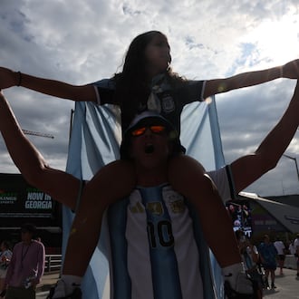 Argentina fans celebrate outside Atlanta Stadium (Mercedes-Benz Stadium) after Argentina wins the FIFA World Cup game between England and Argentina in Atlanta on July 15, 2026. The World Cup brought the world to Atlanta, while giving Nedra Rhone the perfect vehicle for a staycation. (Arvin Temkar/AJC)