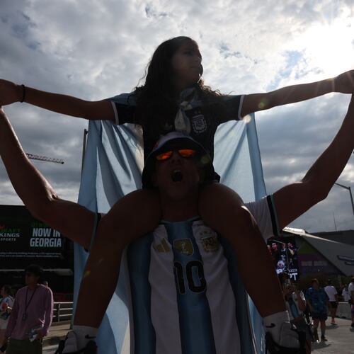 Argentina fans celebrate outside Atlanta Stadium (Mercedes-Benz Stadium) after Argentina wins the FIFA World Cup game between England and Argentina in Atlanta on July 15, 2026. The World Cup brought the world to Atlanta, while giving Nedra Rhone the perfect vehicle for a staycation. (Arvin Temkar/AJC)