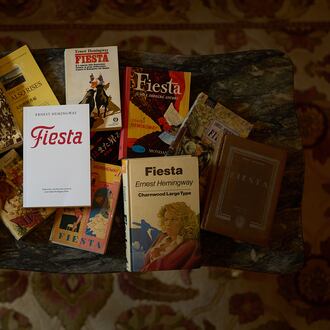 Books by Ernest Hemingway are photographed in the Ernest Hemingway Suite at the Gran Hotel La Perla in Pamplona, northern Spain, Thursday, July 2, 2026. (AP Photo/Miguel Oses)