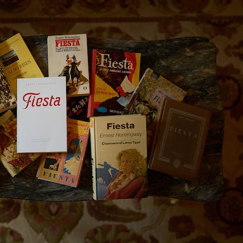 Books by Ernest Hemingway are photographed in the Ernest Hemingway Suite at the Gran Hotel La Perla in Pamplona, northern Spain, Thursday, July 2, 2026. (AP Photo/Miguel Oses)