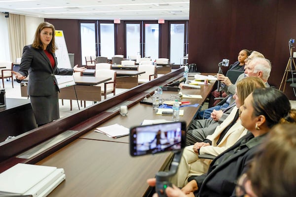Public defender Megan Harrison (left) argues against a Dunwoody apartment complex owner during a mock trial as part of a litigation skills workshop in Atlanta in late August. (Miguel Martinez/AJC)