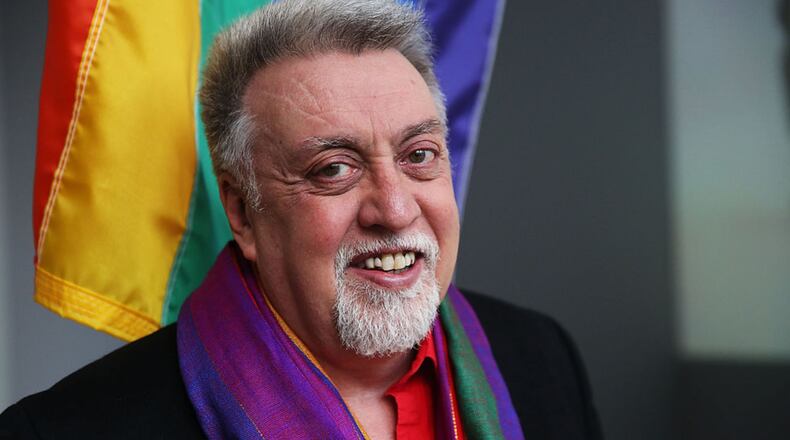 NEW YORK, NY - JANUARY 07:  Rainbow Flag Creator Gilbert Baker poses at the Museum of Modern Art (MoMA) on January 7, 2016 in New York City. MoMa announced in June 2015 its acquisition of the iconic Rainbow Flag into the design collection. Baker, an openly gay artist and civil rights activist, designed the Rainbow Flag in 1978. The flag has since become a prominent symbol to the gay community around the world. (Photo by Spencer Platt/Getty Images)