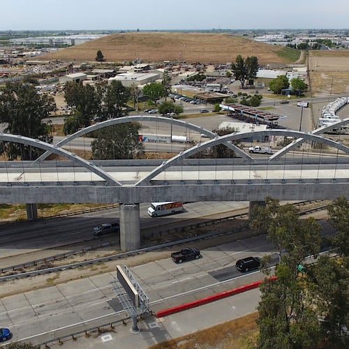 FILE - The Cedar Viaduct, designed to take high-speed trains over Cedar and North avenues and State Route 99, is shown in an aerial view, Tuesday, April 15, 2025, in Fresno, Calif. (AP Photo/Godofredo A. Vásquez, File)