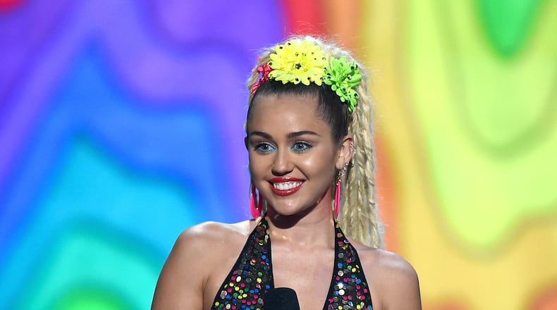LOS ANGELES, CA - AUGUST 30: Host Miley Cyrus speaks onstage during the 2015 MTV Video Music Awards at Microsoft Theater on August 30, 2015 in Los Angeles, California. (Photo by Kevin Winter/MTV1415/Getty Images For MTV)