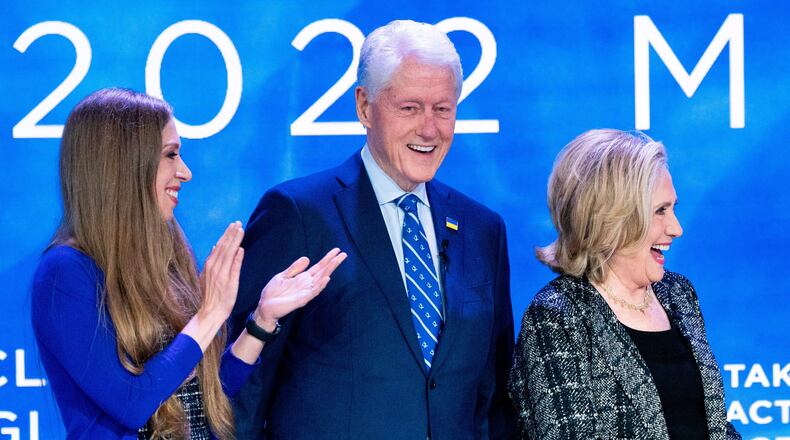 FILE - Chelsea, Bill and Hillary Clinton at the Clinton Global Initiative, Tuesday, Sept. 20, 2022, in New York. (AP Photo/Julia Nikhinson, File)