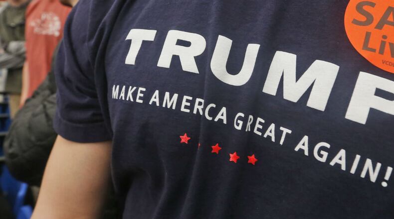 A Cherokee County teacher told students they couldn’t wear T-shirts with President Donald Trump’s “Make America Great Again” slogan.