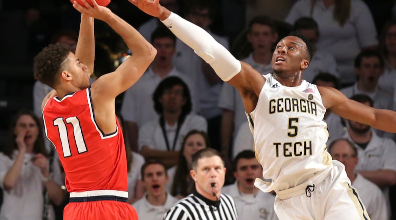 Josh Okogie pressures Belmont guard Kevin McClain into a missed three-point attempt.