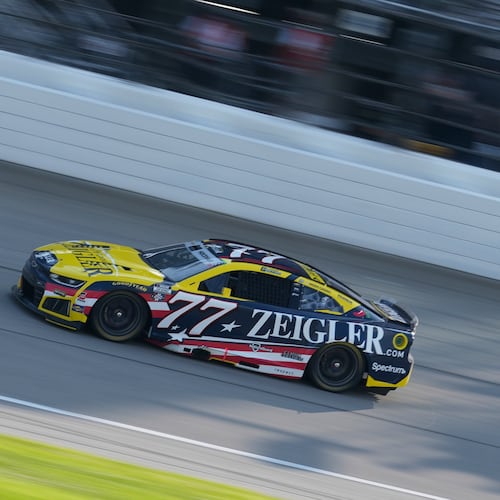 Carson Hocevar (77) drives during a NASCAR Cup Series auto race at Chicagoland Speedway in Joliet, Ill., Sunday, July 5, 2026. (AP Photo/Nam Y. Huh)