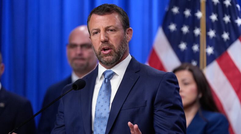 Homeland Security Secretary Markwayne Mullin speaks during a news conference on unaccompanied children at the Justice Department Thursday, June 11, 2026, in Washington. (AP Photo/Manuel Balce Ceneta)