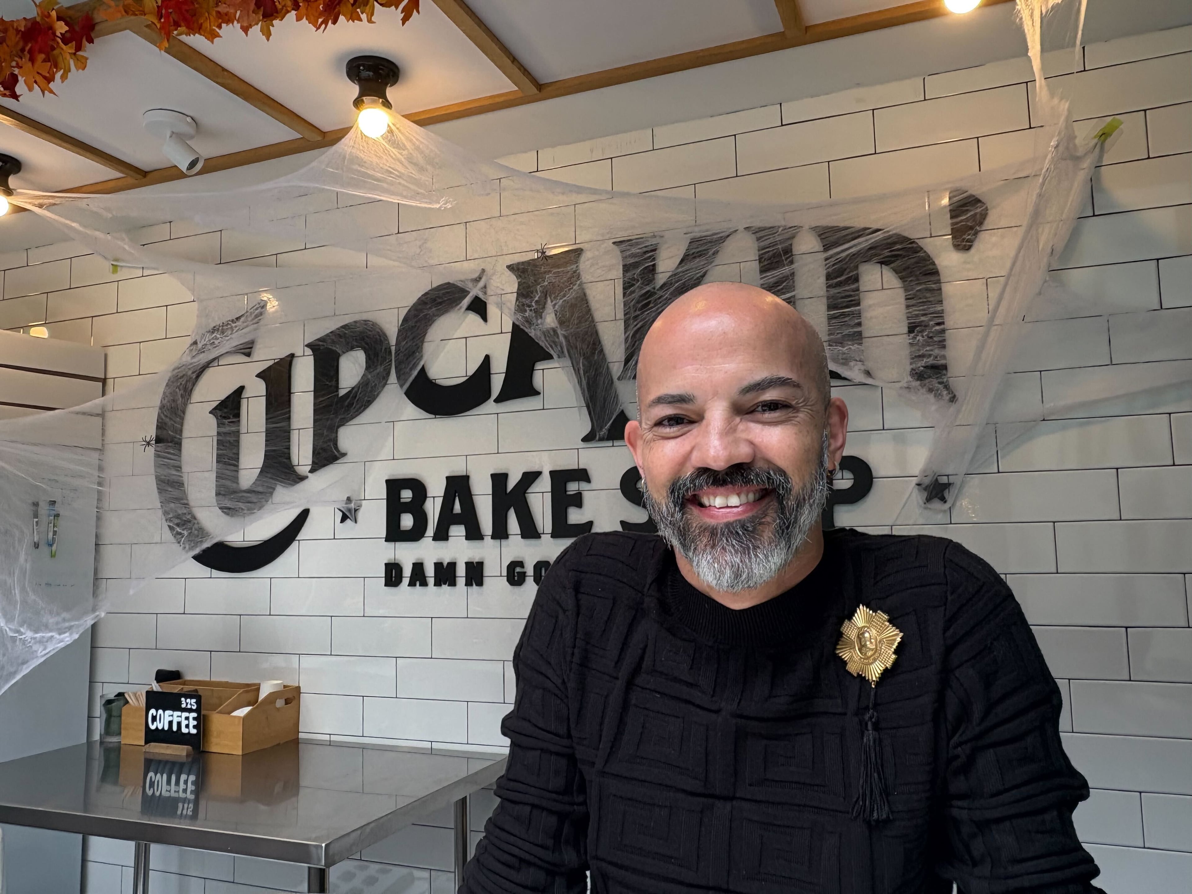 Ronnie Beets, manager of Cupcakin' Bake Shop in Midtown says his commute to work can take 20 minutes, but regularly doubles if he doesn't leave at just the right time. (Rosana Hughes/AJC)