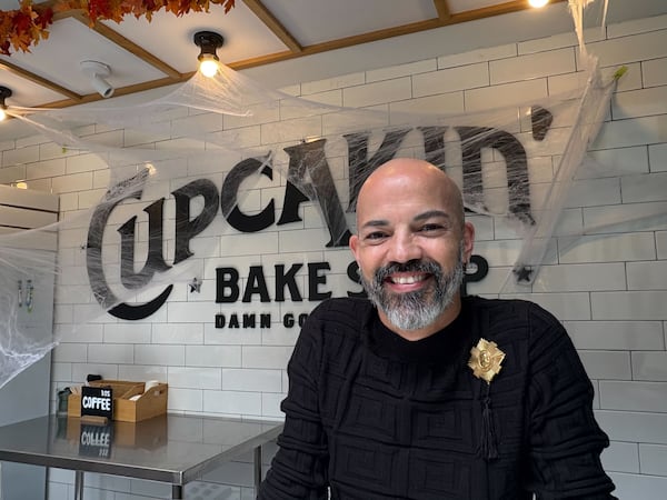 Ronnie Beets, manager of Cupcakin' Bake Shop in Midtown says his commute to work can take 20 minutes, but regularly doubles if he doesn't leave at just the right time. (Rosana Hughes/AJC)