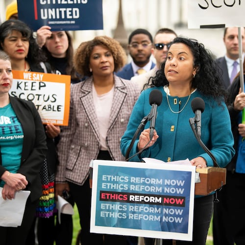 FILE - Analilia Mejia, center, speaks during a rally calling for SCOTUS ethics reform, May 2, 2023, in Washington. (Joy Asico/AP Images for Center for Popular Democracy Action, File)