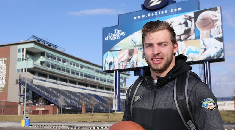 Brian Bell outside the University of Akron's stadium last weekend. (Lew Stamp / for the AJC)