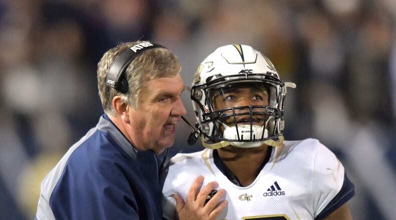 November 10, 2018 Atlanta - Georgia Tech head coach Paul Johnson instructs quarterback TaQuon Marshall in the first half against the Miami at Bobby Dodd Stadium on Saturday, November 10, 2018. HYOSUB SHIN / HSHIN@AJC.COM