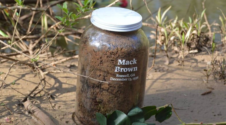 Members from the Fulton County Remembrance Coalition collected soil from the a riverbank near the area where the body of Mack Henry Brown was found in 1936. Photo Courtesy Rev. Patricia Templeton