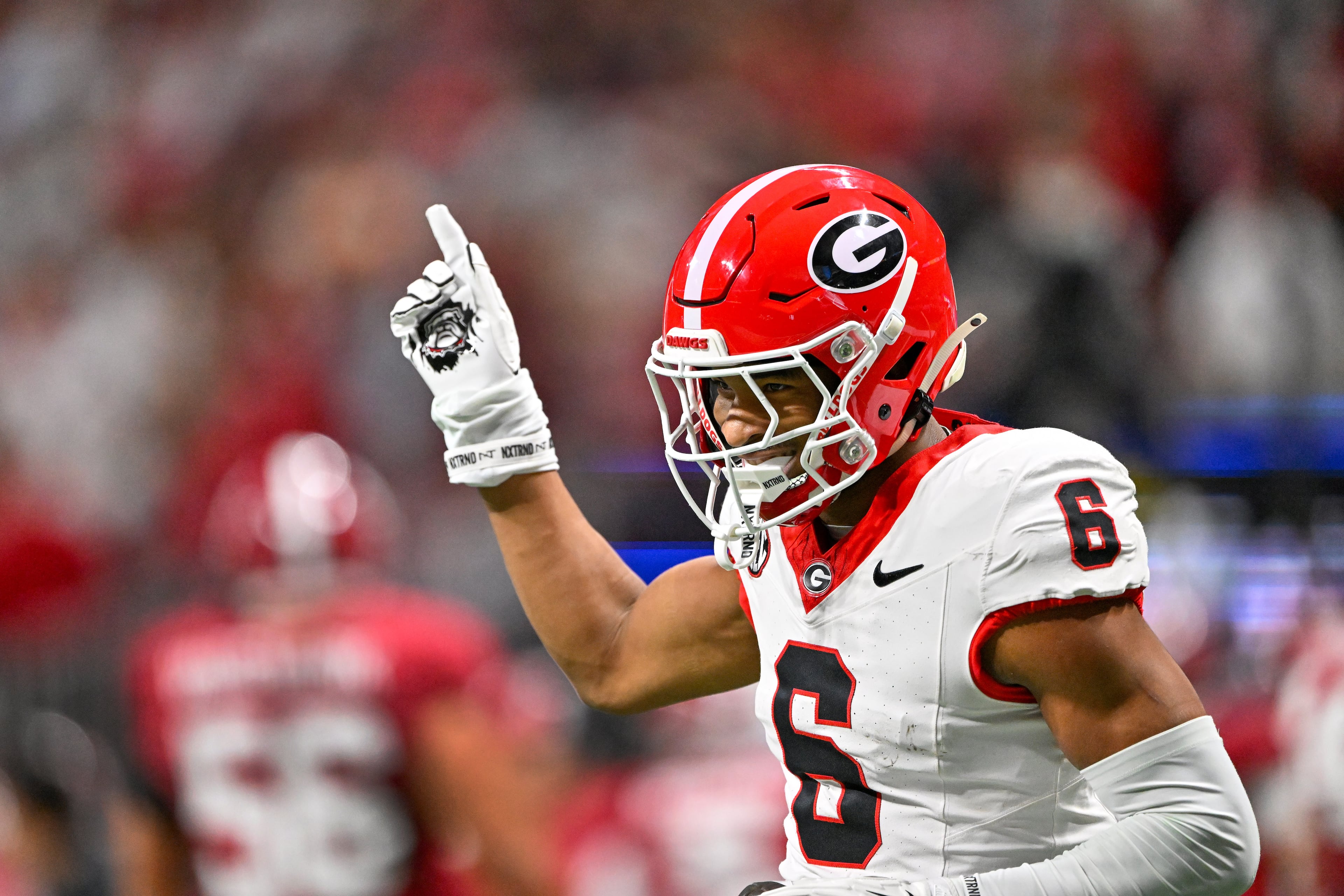 Georgia defensive back Daylen Everette (6)) reacts after intercepting a pass from Alabama quarterback Ty Simpson during the first half of the SEC Championship game at Mercedes-Benz Stadium, Saturday, Dec. 6, 2025, in Atlanta. (Hyosub Shin / AJC)