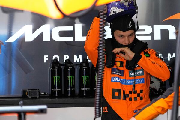 McLaren driver Oscar Piastri of Australia prepares for the qualifying session for the Japanese Formula One Grand Prix at the Suzuka Circuit in Suzuka, central Japan, Saturday, April 5, 2025. (AP Photo/Shuji Kajiyama, Pool)
