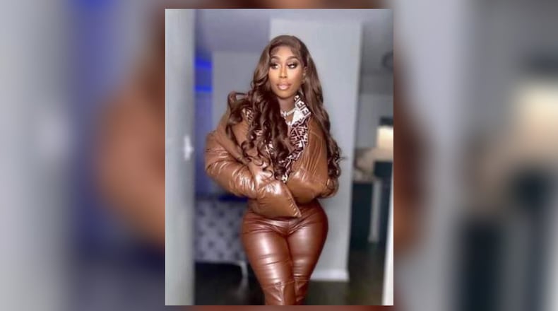 Ashley Burton was 37. A suspect in her killing was charged with murder after being taken into custody on unrelated charges, Atlanta police said.