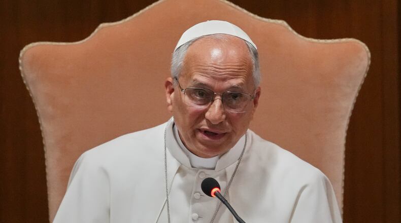 Pope Leo XIV speaks during the presentation of his first encyclical, "Magnifica humanitas: On Safeguarding the Human Person in the Time of Artificial Intelligence," at the Vatican, Monday, May 25, 2026. (AP Photo/Alessandra Tarantino)