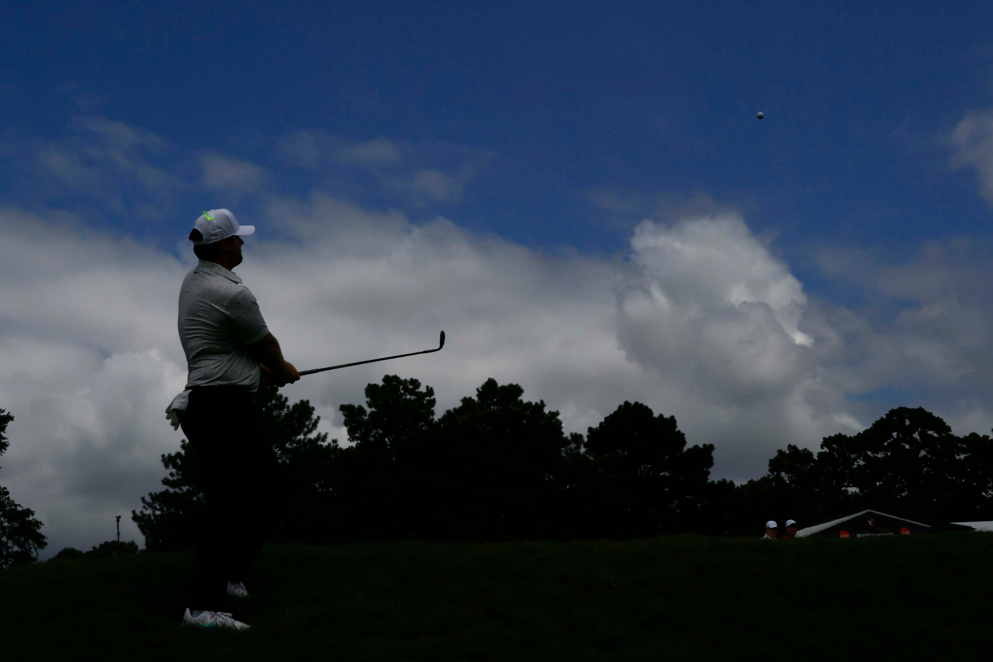 Shane Lowry of Ireland chips the ball on the third hole during the final round of the PGA Tour Championship at East Lake Golf Club on Sunday, Aug. 24, 2025, in Atlanta. (Miguel Martinez/ AJC)