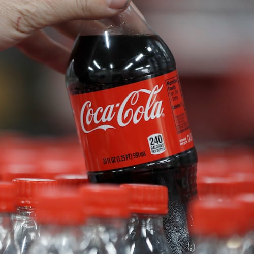 A bottle of Coke-Cola is pulled for a quality control test at a Coco-Cola bottling plant on February 10, 2017 in Salt Lake City, Utah. Current Coke president James Quincey will become CEO on May 1. (Photo by George Frey/Getty Images)