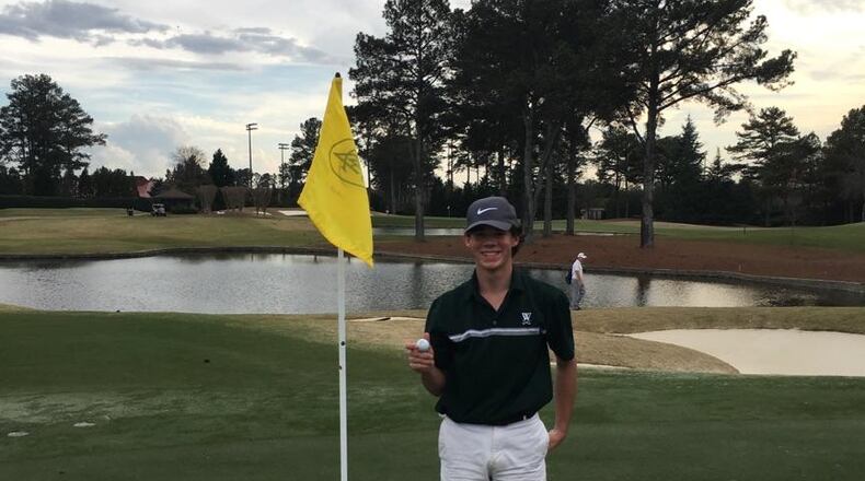 Thomas DeWalt of Westminster grins after a hole-in-one.