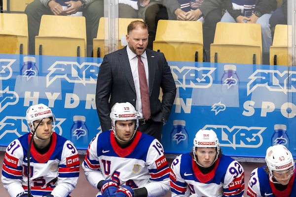 Ryan Warsofsky, head coach of USA national ice hockey team looks on, during the IIHF 2025 World Championship preliminary round group B game between Kazakhstan and USA, at the Jyske Bank Boxen, in Herning, Denmark, Sunday, May 18, 2025. (Salvatore Di Nolfi/Keystone via AP)