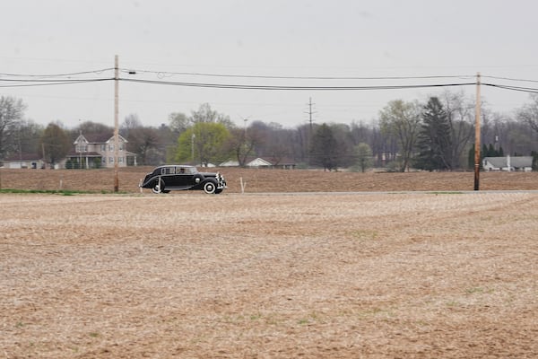 Mike Fowler drives a 1946 Rolls-Royce Silver Wraith from the The Rolls-Royce Foundation's collection in Mechanicsburg, Pa., Saturday, April 5, 2025. (AP Photo/Matt Rourke)