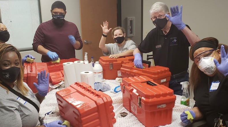 MRC GEM volunteers prepare emergency response kits. (Courtesy MRC GEM Prep Kits)