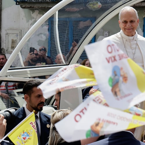 Pope Leo XIV rides on his popemobile during his one-day pastoral visit in Acerra, Italy, Saturday, May 23, 2026. (AP Photo/Salvatore Laporta)