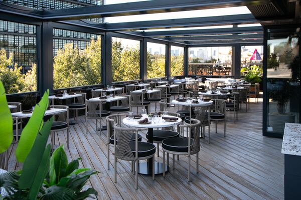 Azara has a main dining room, a bistro and a cafe with its own hours and a spectacular rooftop bar that can be fully enclosed. (Erik Meadows Photography. Courtesy of Azara)